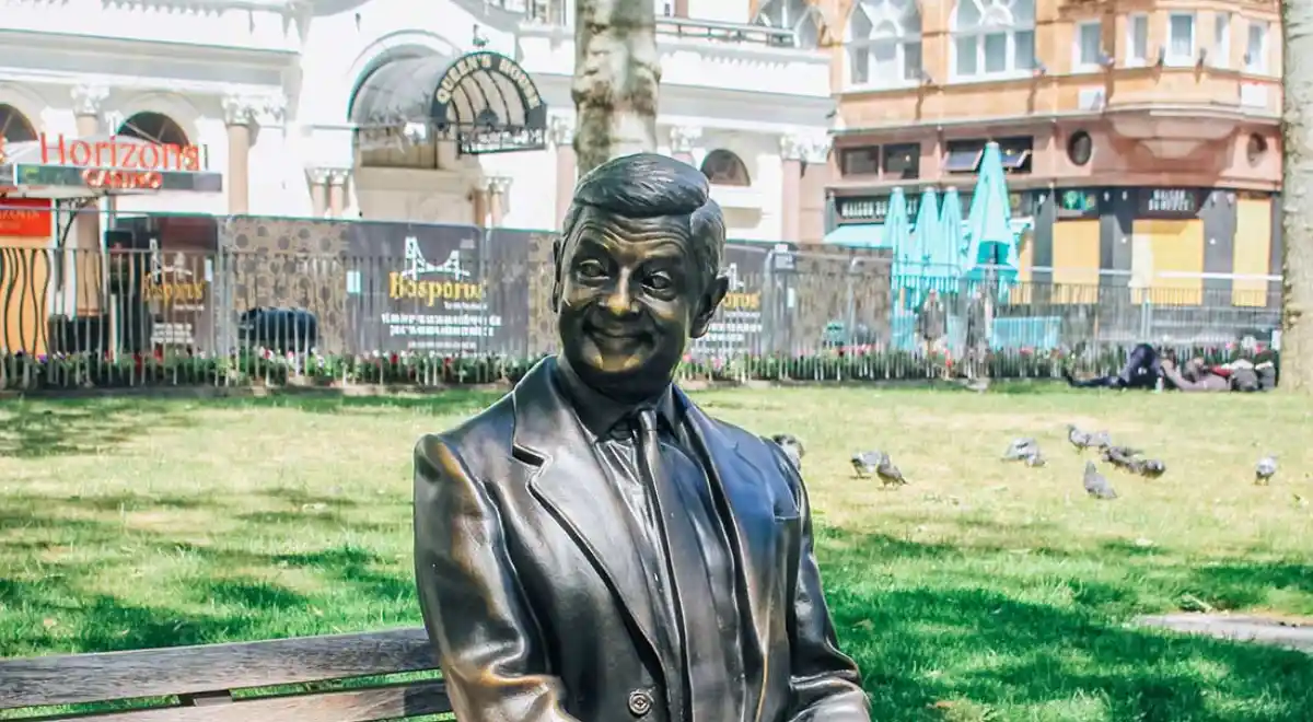 Bronze statues in Leicester Square Gardens